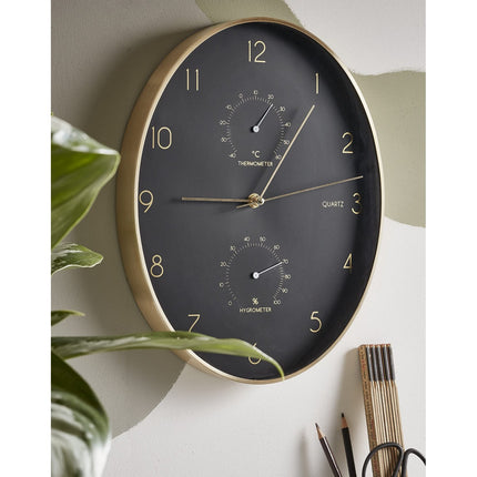 Wanduhr Mica Decorations Andy Schwarz Gold Oval Aluminium (Ø 35 x 4.5 cm)